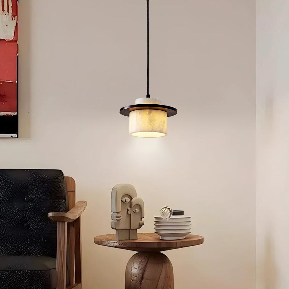 Wabi Sabi natural marble pendant light in living room reading nook, warm ambient glow