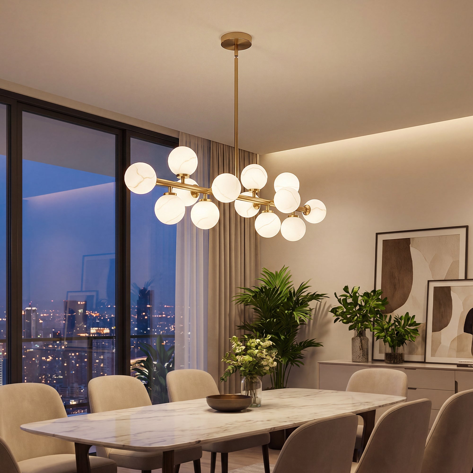 Modern gold alabaster chandelier hanging above large family dining room city view scene