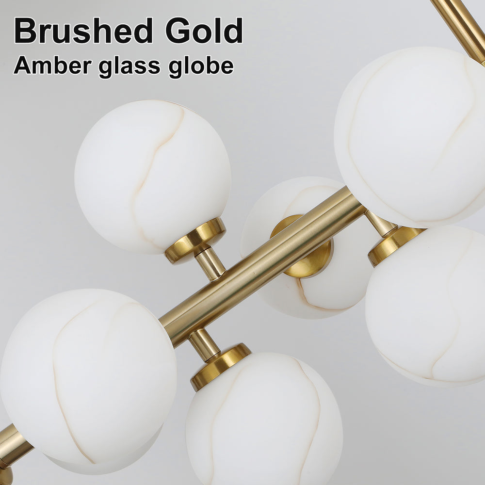 Close up brushed gold frame white marble vein frosted glass globe lampshade detail