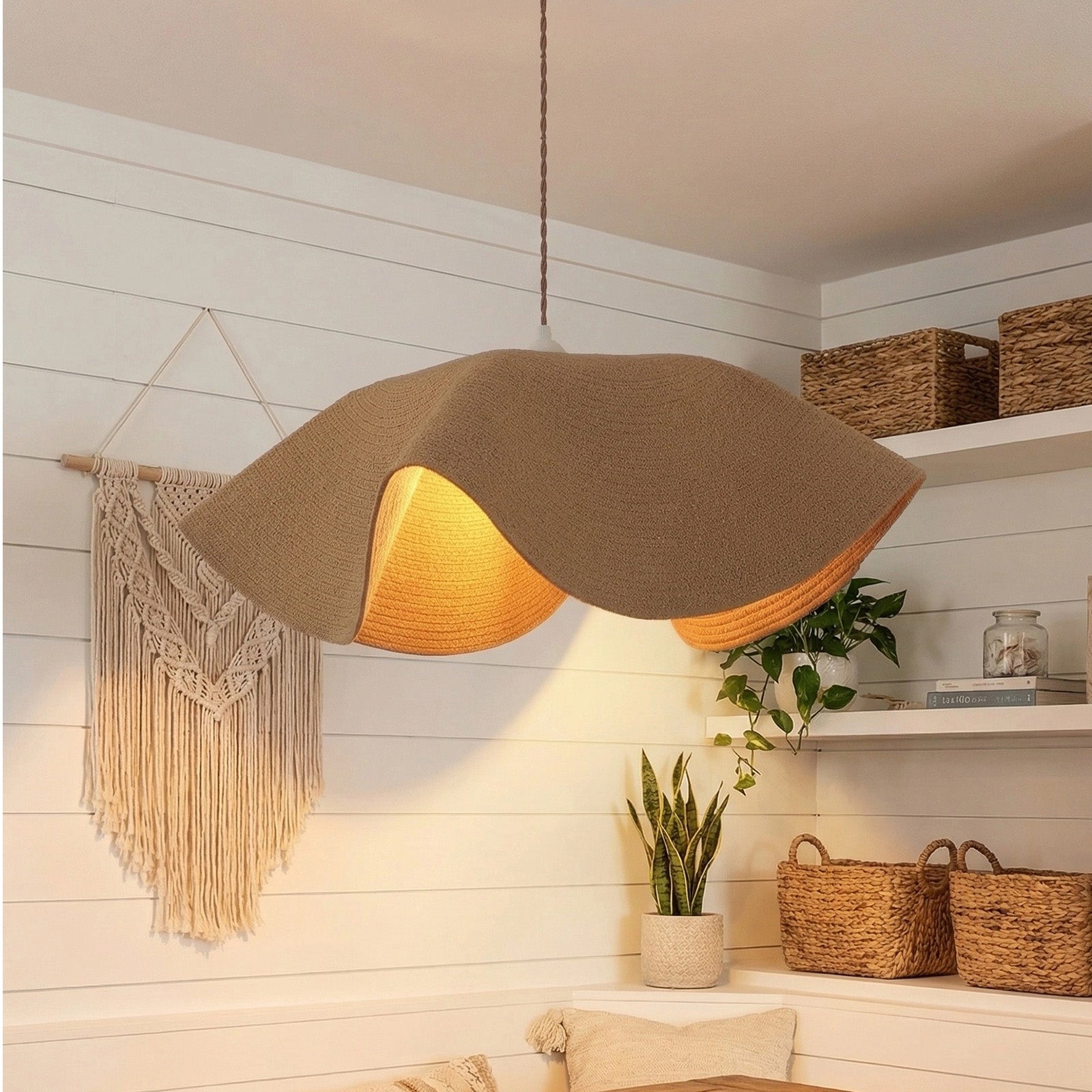 Wavy rattan pendant light in bright boho room 