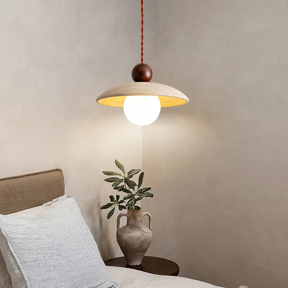 Bedside travertine pendant light with bulb, cozy nightstand decor
