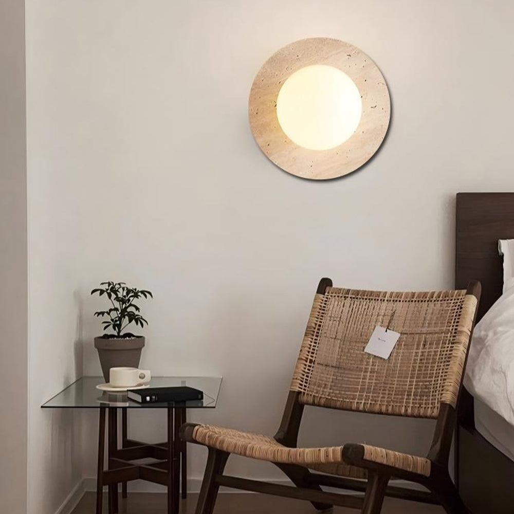 Minimalist travertine wall light fixture in neutral-toned room