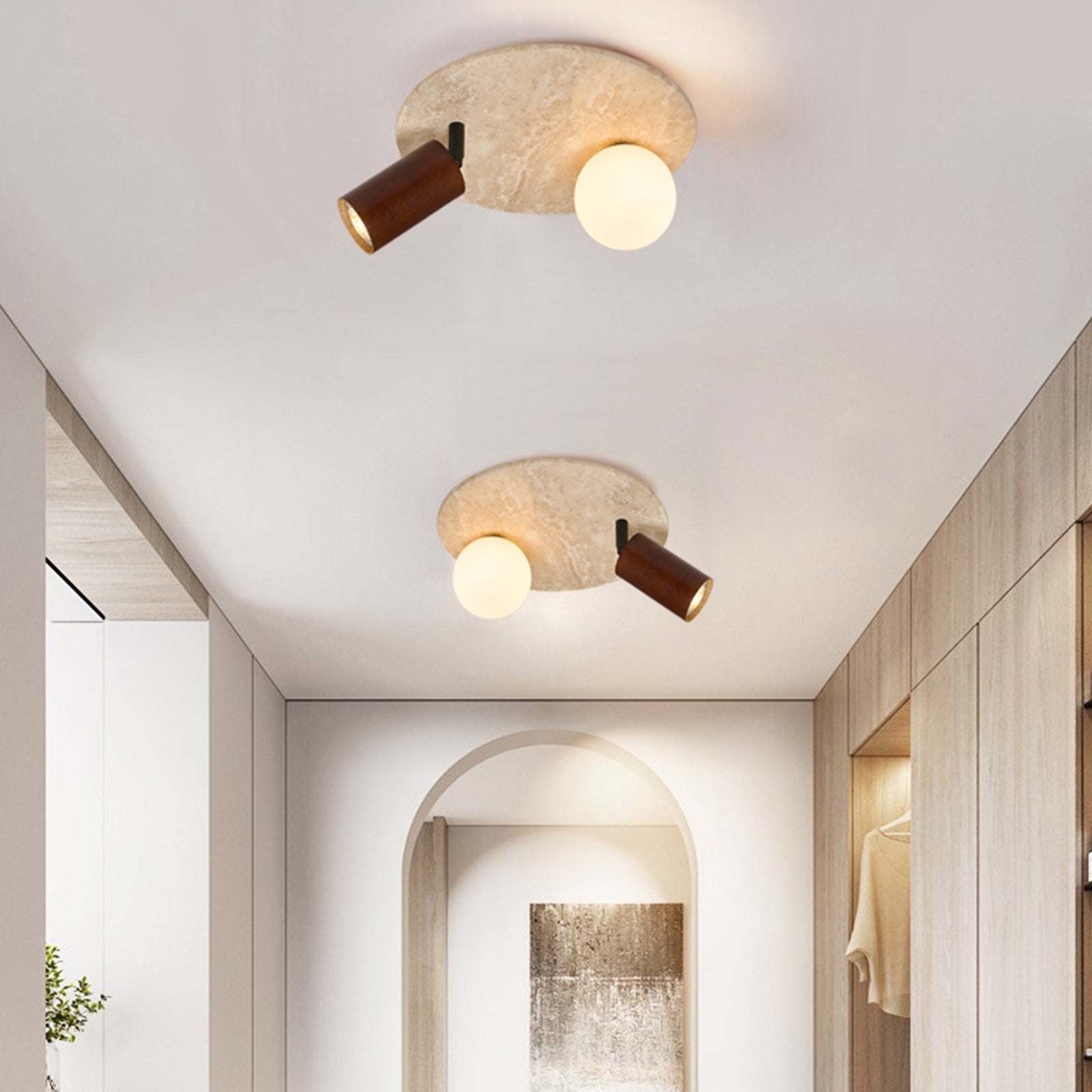 Two travertine ceiling lights in minimalist corridor