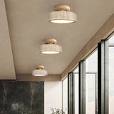3 natural wood travertine ceiling lights in hallway