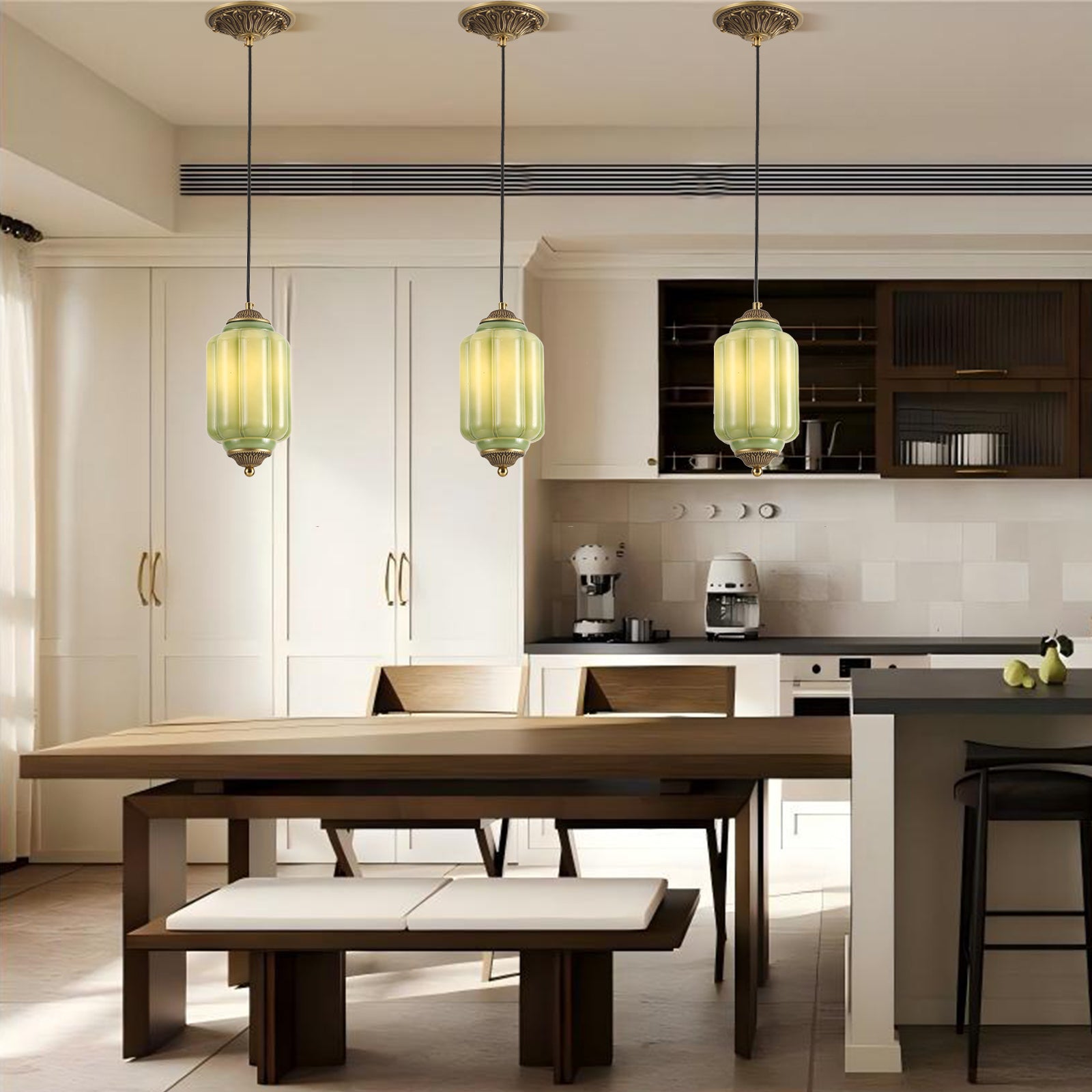 Vintage green ceramic pendant lights above a wooden dining table in a modern kitchen